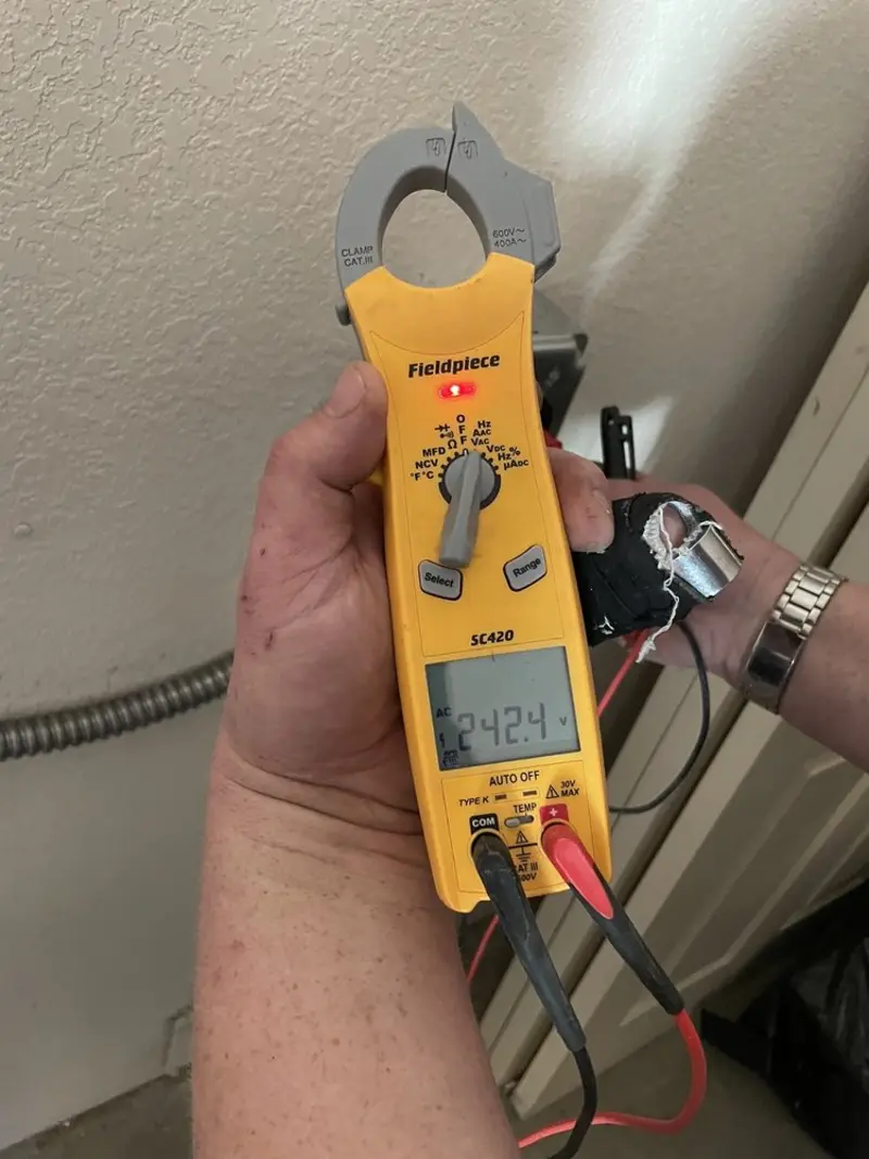 Voltage testing with clamp meter during Electrical Installation Services in Mercer Island